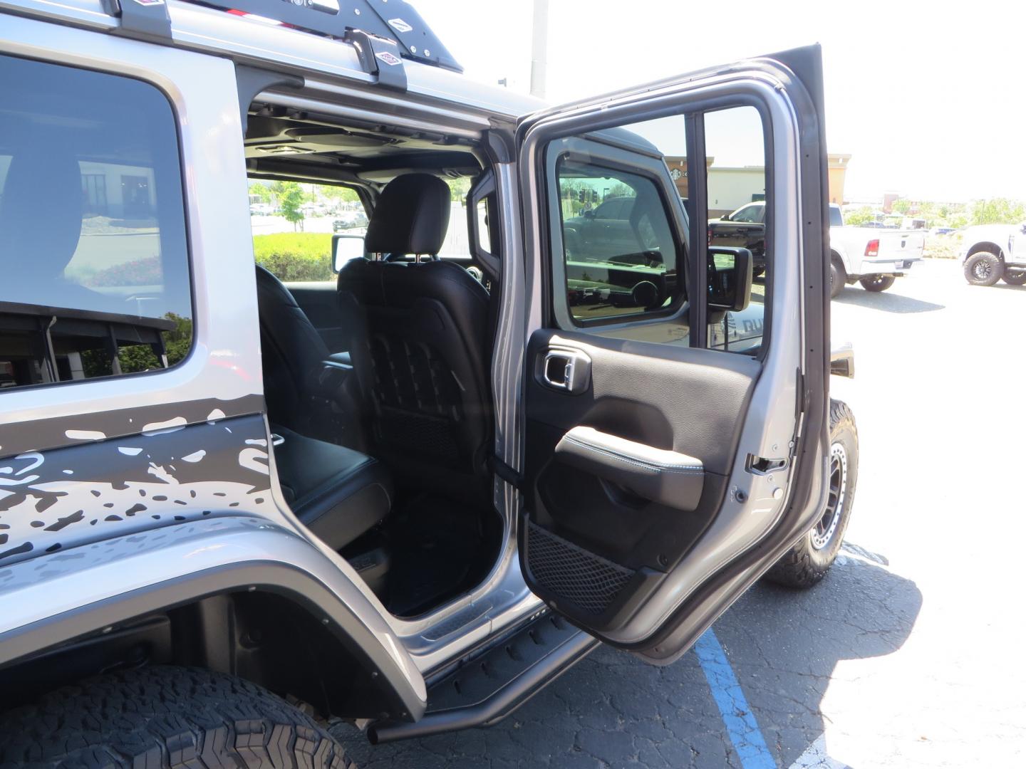 2021 SILVER /BLACK Jeep Wrangler Unlimited Rubicon 4XE 4d SUV 4wd (1C4JJXR63MW) with an 2.0L L4 DOHC 16V TURBO engine, automatic transmission, located at 2630 Grass Valley Highway, Auburn, CA, 95603, (530) 508-5100, 38.937893, -121.095482 - Impressive 4xe Rubicon with a ton of extras that include Fox 3.0 internal bypass front and rear shocks, 315 BFG KO2 tires, Warn winch, Factor 55 Ultra hook, Front bumper stinger, Rigid Pods on front bumper, Rigid A series lights in the roof rack, DV8 lockable hood pins, Westin Running boards, Fury d - Photo#60